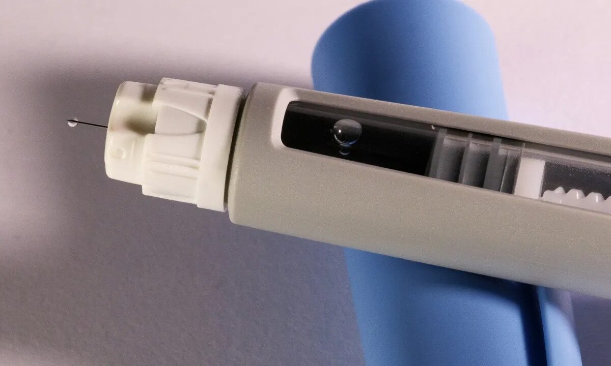 Close-up of a GLP-1 injection pen